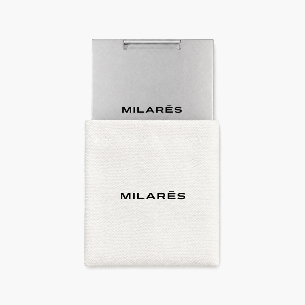silver compact mirror